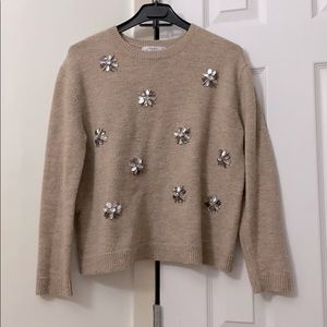 Light brown sweatshirt.
